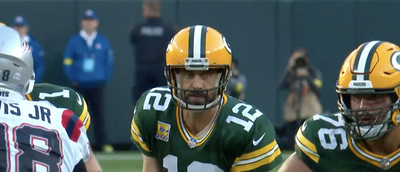 Tony Romo had a priceless reaction to Aaron Rodgers’ loud pre-snap F-bomb