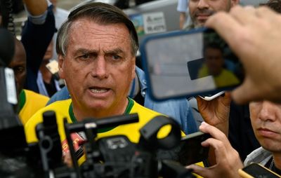 Brazil heads for runoff as Bolsonaro beats expectations