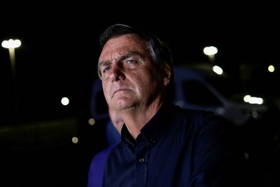 Brazil girds for tight runoff vote after Bolsonaro's strong showing