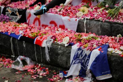 Death toll for child victims of Indonesia soccer stampede reaches 32 - official