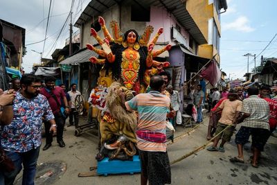 AP PHOTOS: Artists paint, mold idols for Durga Puja festival