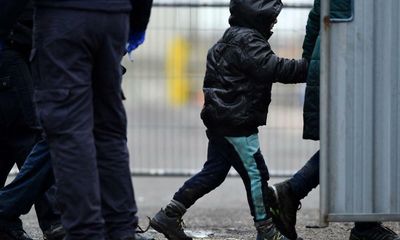 Police taking photos and fingerprints of lone children arriving in UK