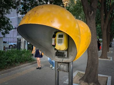 A public payphone in China began ringing and ringing. Who was calling?