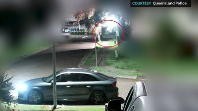 Queensland police release CCTV footage in hunt for armed attackers after man shot dead in Brisbane front yard