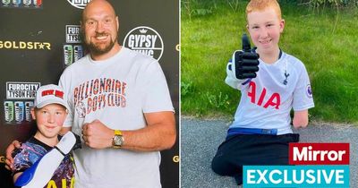 Boy, 14, fist bumbs Tyson Fury after boxer helped raise funds for prosthetic arm