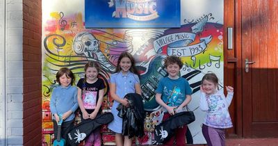 Lanarkshire music school celebrate being best in the business with rock 'n' roll mural