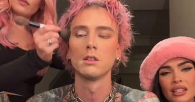 Machine Gun Kelly gets make-up done by fiancée Megan Fox and assistant Olivia Stone