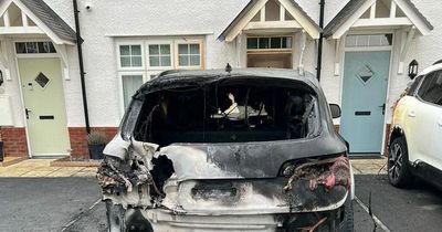 Mum and young son escape house after masked men torch Audi in driveway