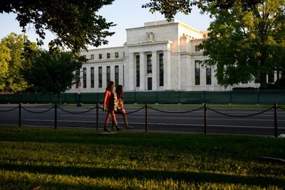 Stocks surge on interest rate hopes