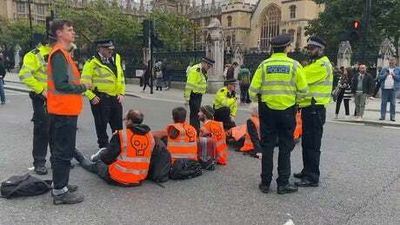 Just Stop Oil protestors block roads outside Parliament