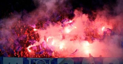Rangers fans start Anfield pyro show as supporters light up Liverpool with flares