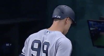 Frustrated Aaron Judge slammed his helmet in the dugout after missing a golden chance at 62