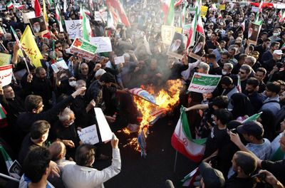 Iran rocked by protests; world watches politely
