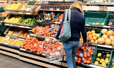 Tesco to cut 300 head office jobs while raising pay for shop workers