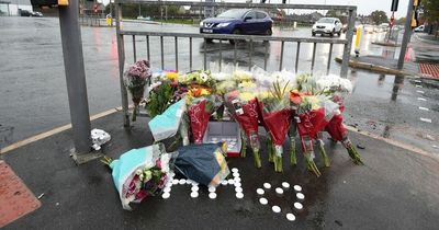 Candles and flowers left for teen killed in crash as murder probe launched