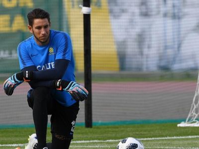 Glory sign keeper as cover for Brad Jones