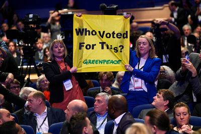 Greenpeace protesters interrupt UK PM Truss's speech at party conference