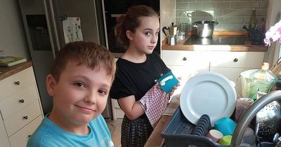 Dad shames kids into doing dishes using child labour poster