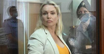 Russian who shared anti-war message on live TV confirms she's escaped arrest