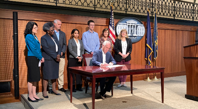 Louisville mayor signs order to reach net-zero emissions by 2040