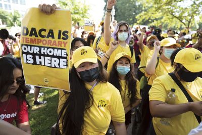 An appeals court rules against DACA, but the program continues — for now