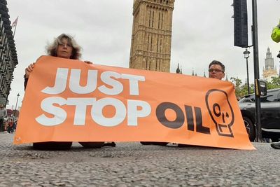 Just Stop Oil protesters glue themselves to roads around Trafalgar Square