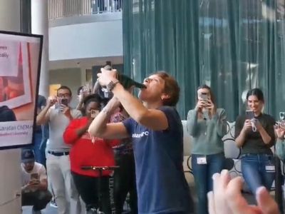 See this year's Nobel Prize-winning scientists swig bubbly and get cheered at work