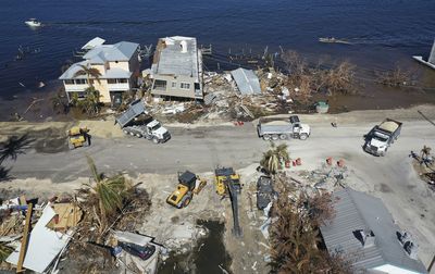 Florida officials are scrambling to limit Hurricane Ian's impact on the election