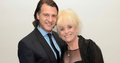 Trolls accused Barbara Windsor's widow of 'playing the long game' after the icon's death
