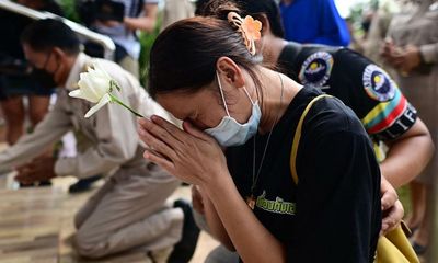 ‘I saw my grandson’s name and I fainted’: grief engulfs town after Thailand nursery attack