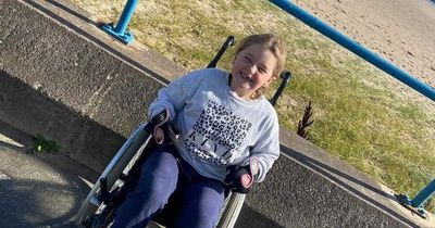 Kind runner saves the day for eight-year-old's Great North Run junior wheelchair race