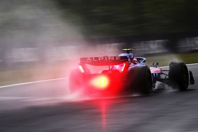 Fernando Alonso tops wet first practice at Japanese Grand Prix