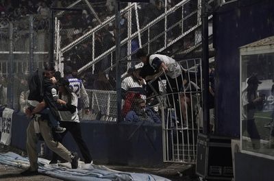 Soccer-Argentina govt fires security chief after fan dies in match scuffle