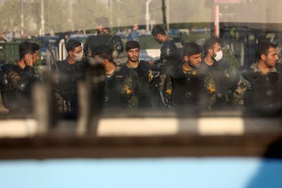 Iran denies security forces killed 16-year-old, says she fell off roof-Iranian media