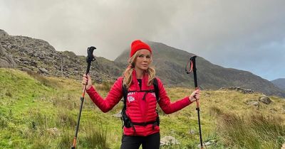 Amanda Holden pops Champagne at Ben Nevis summit after completing Three Peak Challenge