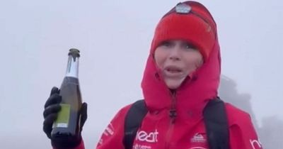 Amanda Holden swigs champagne at 4,000 feet after completing epic 3 Peaks Challenge