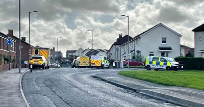 Police cars and ambulances descend on Ayrshire street