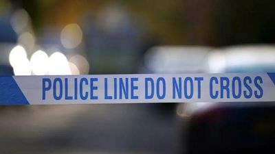 Armed man shot dead by police in car park