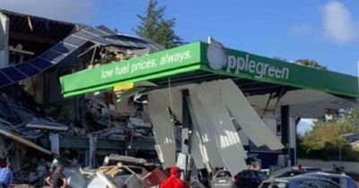Three killed and scores injured after major explosion tears through petrol station
