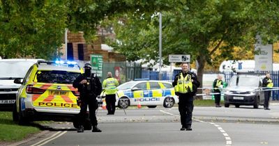 Armed officers shoot knifeman dead in police station car park