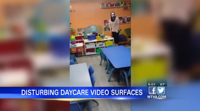 Daycare workers fired after being caught on video chasing crying children in Halloween mask