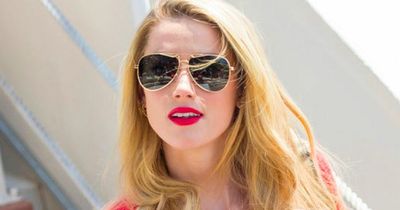 Amber Heard spotted enjoying Spanish holiday five months on from Johnny Depp trial