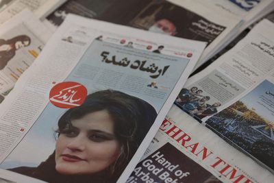 Women students tell Iran's president to 'get lost' as unrest rages