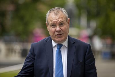 Tory minister sacked 'after being seen touching young man's thigh in bar'