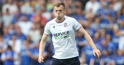 Why George Johnston was substituted at half-time of Bolton's loss to Forest Green