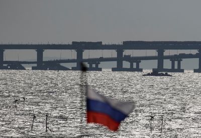 Russian divers to inspect damage to vital Crimea bridge link