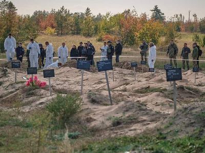 ‘Terrible things happened here’: Entire families believed to be inside mass graves in Ukraine’s Lyman