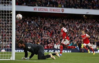 Bukayo Saka sends Arsenal back to summit after thrilling win over Liverpool