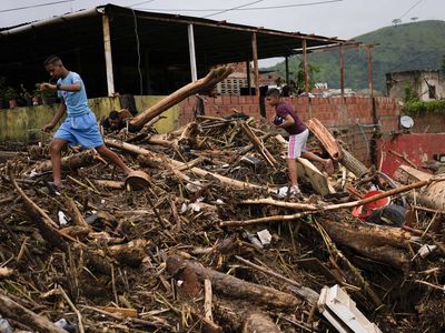 Tales of survival emerge as Venezuela landslide toll hits 34