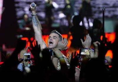 Robbie Williams at the O2 review: A heavyweight set of classic pop hits